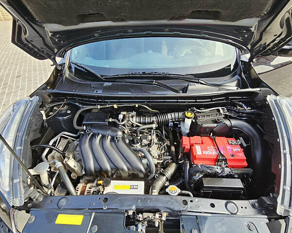 Черный Ниссан Жук, объемом двигателя 1.6 л и пробегом 120 тыс. км за 13333 $, фото 11 на Automoto.ua