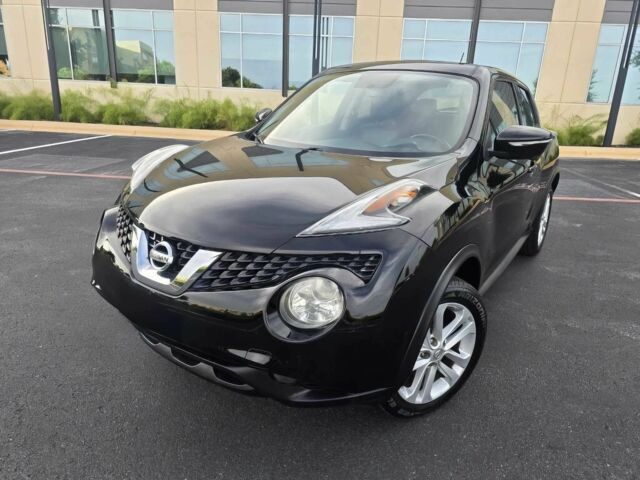 Черный Ниссан Жук, объемом двигателя 1.6 л и пробегом 70 тыс. км за 4800 $, фото 2 на Automoto.ua