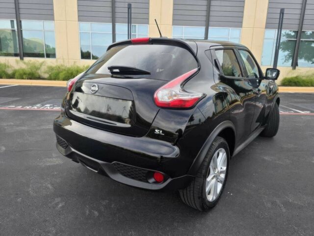 Черный Ниссан Жук, объемом двигателя 1.6 л и пробегом 75 тыс. км за 3900 $, фото 5 на Automoto.ua