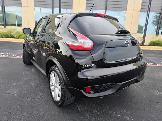 Черный Ниссан Жук, объемом двигателя 1.6 л и пробегом 70 тыс. км за 10000 $, фото 5 на Automoto.ua