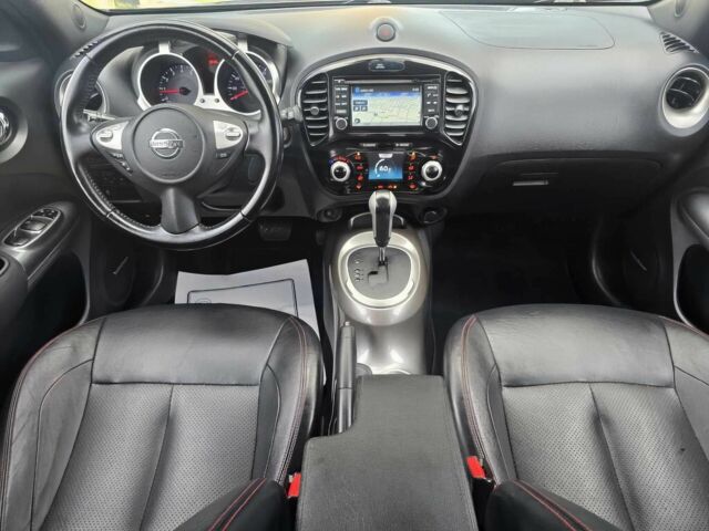 Черный Ниссан Жук, объемом двигателя 1.6 л и пробегом 70 тыс. км за 4800 $, фото 9 на Automoto.ua