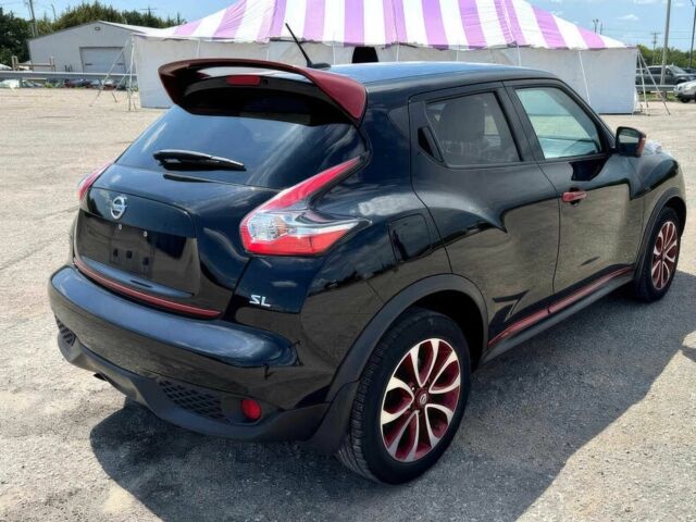 Черный Ниссан Жук, объемом двигателя 1.6 л и пробегом 74 тыс. км за 6000 $, фото 4 на Automoto.ua