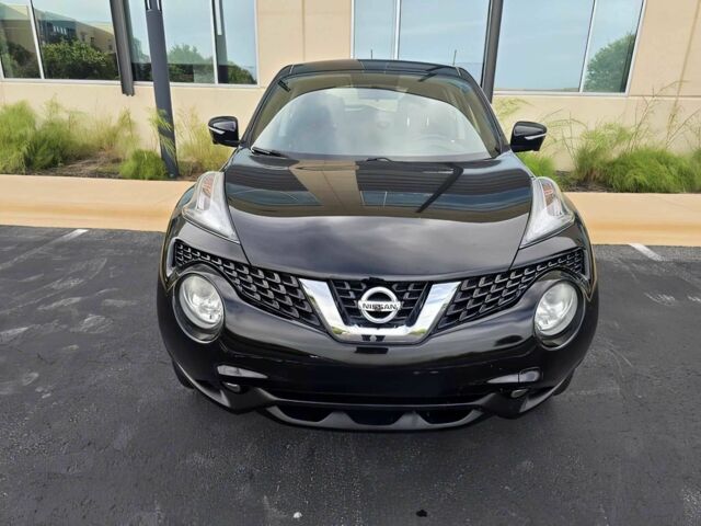 Черный Ниссан Жук, объемом двигателя 1.6 л и пробегом 70 тыс. км за 10000 $, фото 1 на Automoto.ua