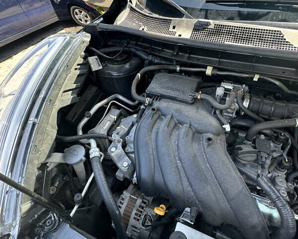 Черный Ниссан Жук, объемом двигателя 1.6 л и пробегом 57 тыс. км за 12900 $, фото 34 на Automoto.ua