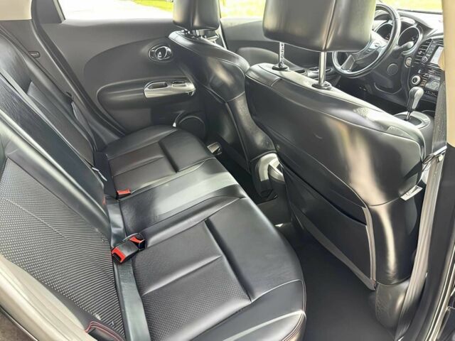 Чорний Ніссан Жук, об'ємом двигуна 1.6 л та пробігом 75 тис. км за 6000 $, фото 9 на Automoto.ua