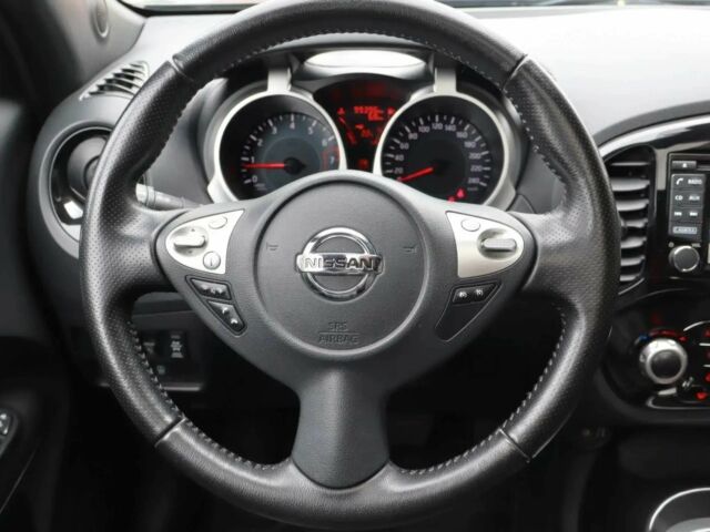 Черный Ниссан Жук, объемом двигателя 1.6 л и пробегом 71 тыс. км за 8000 $, фото 6 на Automoto.ua