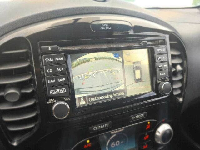 Черный Ниссан Жук, объемом двигателя 1.6 л и пробегом 75 тыс. км за 3900 $, фото 10 на Automoto.ua