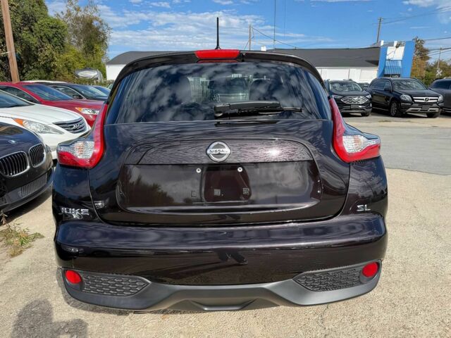 Чорний Ніссан Жук, об'ємом двигуна 1.6 л та пробігом 50 тис. км за 7000 $, фото 5 на Automoto.ua