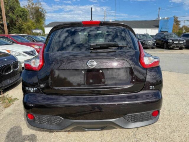 Чорний Ніссан Жук, об'ємом двигуна 1.6 л та пробігом 50 тис. км за 6700 $, фото 3 на Automoto.ua