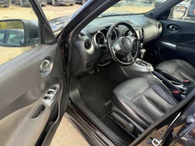 Чорний Ніссан Жук, об'ємом двигуна 1.6 л та пробігом 50 тис. км за 6700 $, фото 6 на Automoto.ua