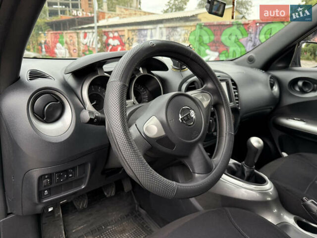 Черный Ниссан Жук, объемом двигателя 1.6 л и пробегом 80 тыс. км за 12222 $, фото 17 на Automoto.ua