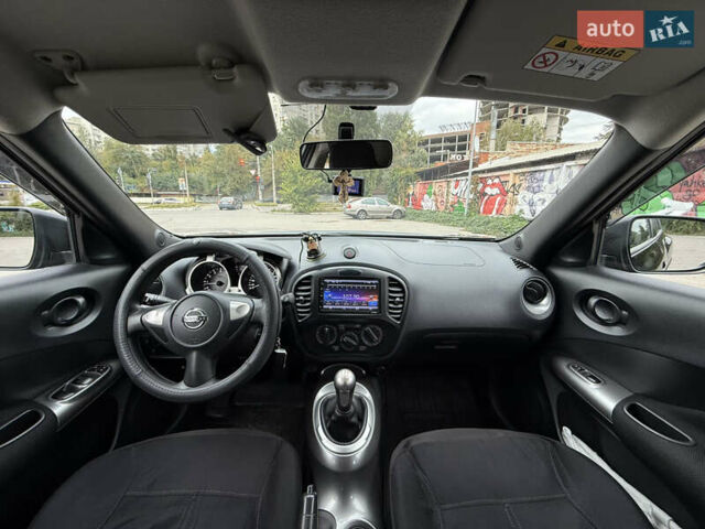 Черный Ниссан Жук, объемом двигателя 1.6 л и пробегом 80 тыс. км за 12222 $, фото 28 на Automoto.ua