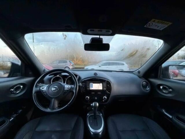 Черный Ниссан Жук, объемом двигателя 1.6 л и пробегом 41 тыс. км за 7000 $, фото 6 на Automoto.ua