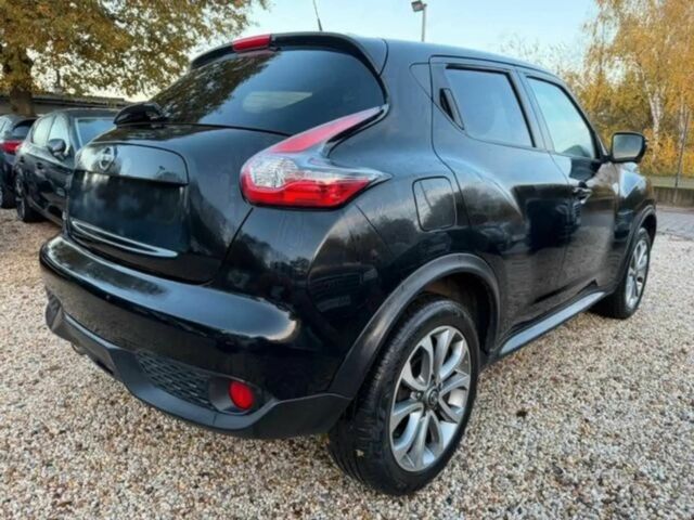 Черный Ниссан Жук, объемом двигателя 1.6 л и пробегом 41 тыс. км за 7000 $, фото 2 на Automoto.ua