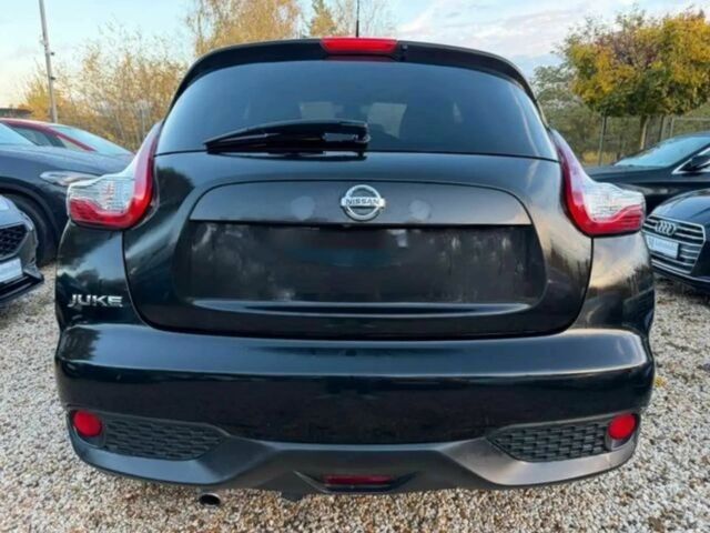 Черный Ниссан Жук, объемом двигателя 1.6 л и пробегом 41 тыс. км за 7000 $, фото 3 на Automoto.ua