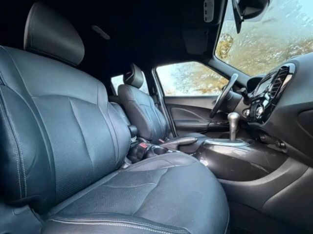 Черный Ниссан Жук, объемом двигателя 1.6 л и пробегом 41 тыс. км за 7000 $, фото 7 на Automoto.ua