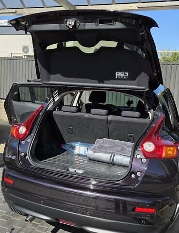 Фиолетовый Ниссан Жук, объемом двигателя 1.6 л и пробегом 160 тыс. км за 10500 $, фото 4 на Automoto.ua