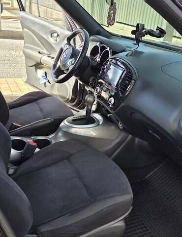 Фиолетовый Ниссан Жук, объемом двигателя 1.6 л и пробегом 160 тыс. км за 10500 $, фото 8 на Automoto.ua