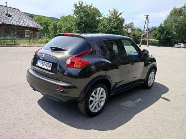 Коричневый Ниссан Жук, объемом двигателя 1.6 л и пробегом 170 тыс. км за 7200 $, фото 17 на Automoto.ua