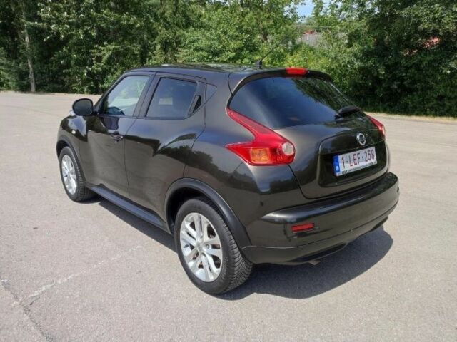 Коричневый Ниссан Жук, объемом двигателя 1.6 л и пробегом 170 тыс. км за 7200 $, фото 6 на Automoto.ua