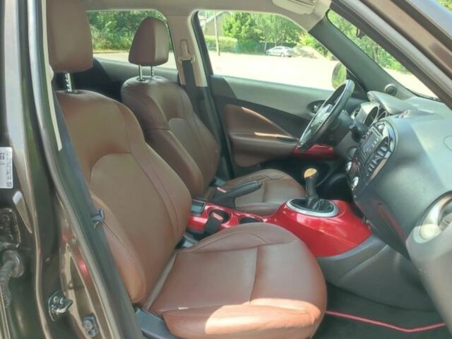 Коричневый Ниссан Жук, объемом двигателя 1.6 л и пробегом 170 тыс. км за 7200 $, фото 7 на Automoto.ua