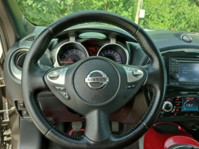 Коричневый Ниссан Жук, объемом двигателя 1.6 л и пробегом 170 тыс. км за 7200 $, фото 5 на Automoto.ua