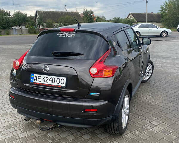 Коричневий Ніссан Жук, об'ємом двигуна 1.5 л та пробігом 235 тис. км за 9900 $, фото 1 на Automoto.ua