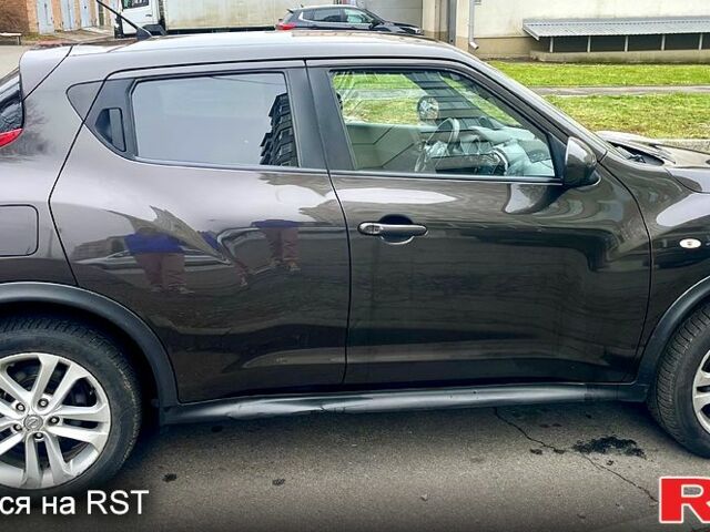 Коричневый Ниссан Жук, объемом двигателя 1.6 л и пробегом 130 тыс. км за 9500 $, фото 6 на Automoto.ua