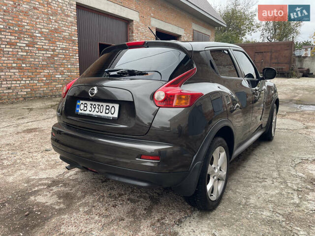 Коричневый Ниссан Жук, объемом двигателя 1.6 л и пробегом 105 тыс. км за 11000 $, фото 5 на Automoto.ua