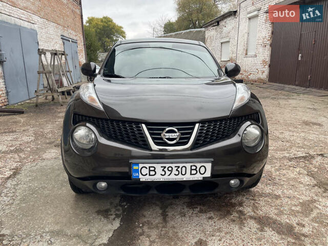 Коричневый Ниссан Жук, объемом двигателя 1.6 л и пробегом 105 тыс. км за 11000 $, фото 6 на Automoto.ua