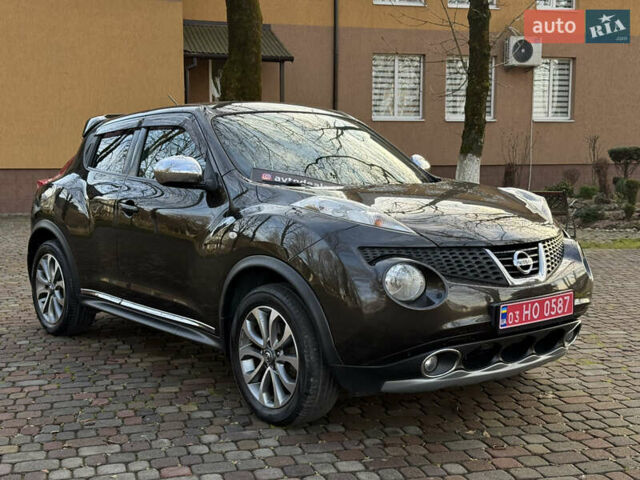 Коричневый Ниссан Жук, объемом двигателя 1.6 л и пробегом 158 тыс. км за 11400 $, фото 2 на Automoto.ua