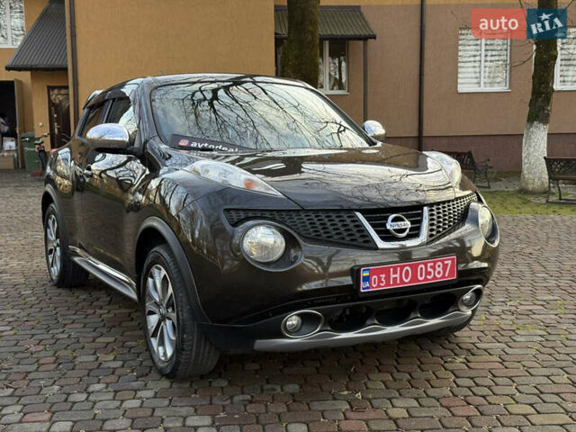 Коричневый Ниссан Жук, объемом двигателя 1.6 л и пробегом 158 тыс. км за 11400 $, фото 1 на Automoto.ua