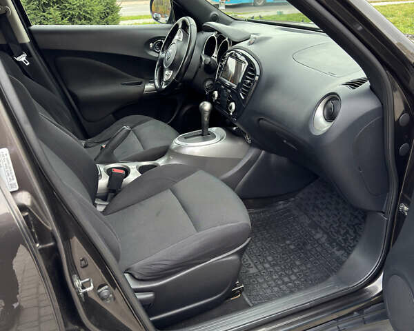 Коричневый Ниссан Жук, объемом двигателя 1.6 л и пробегом 139 тыс. км за 8599 $, фото 8 на Automoto.ua