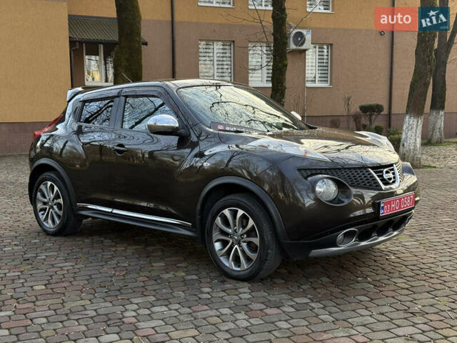 Коричневый Ниссан Жук, объемом двигателя 1.6 л и пробегом 158 тыс. км за 11400 $, фото 4 на Automoto.ua