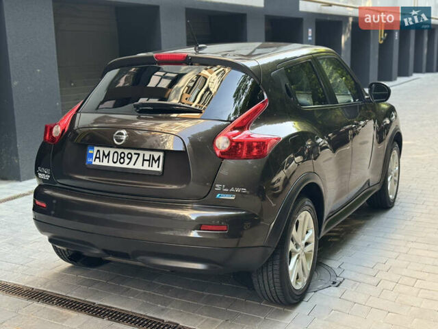 Коричневый Ниссан Жук, объемом двигателя 1.62 л и пробегом 230 тыс. км за 10300 $, фото 6 на Automoto.ua