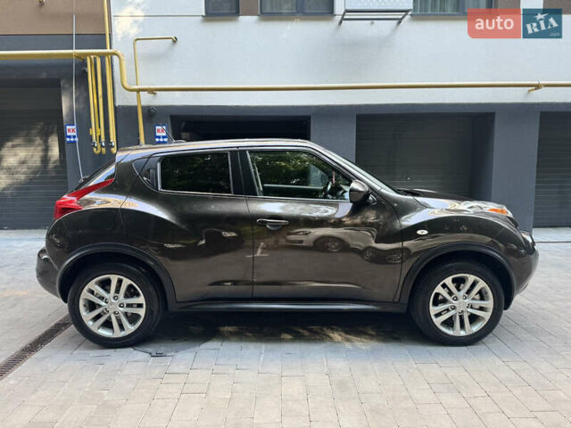 Коричневый Ниссан Жук, объемом двигателя 1.62 л и пробегом 230 тыс. км за 10300 $, фото 4 на Automoto.ua