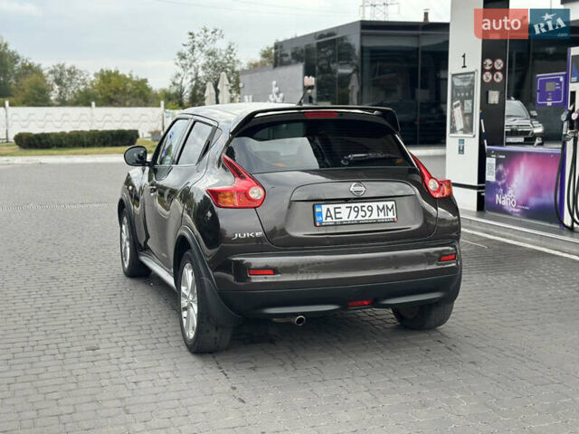 Коричневый Ниссан Жук, объемом двигателя 1.6 л и пробегом 162 тыс. км за 8600 $, фото 5 на Automoto.ua