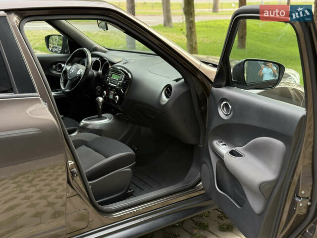 Коричневый Ниссан Жук, объемом двигателя 1.6 л и пробегом 85 тыс. км за 15700 $, фото 13 на Automoto.ua