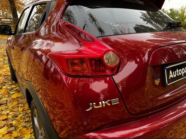 Красный Ниссан Жук, объемом двигателя 1.6 л и пробегом 131 тыс. км за 9990 $, фото 7 на Automoto.ua