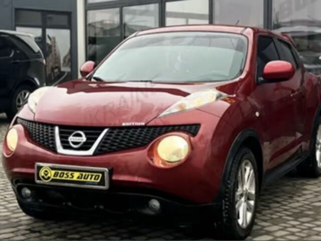 Червоний Ніссан Жук, об'ємом двигуна 1.6 л та пробігом 200 тис. км за 10000 $, фото 1 на Automoto.ua