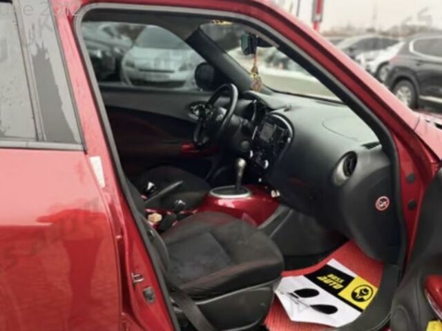 Червоний Ніссан Жук, об'ємом двигуна 1.6 л та пробігом 200 тис. км за 10000 $, фото 7 на Automoto.ua