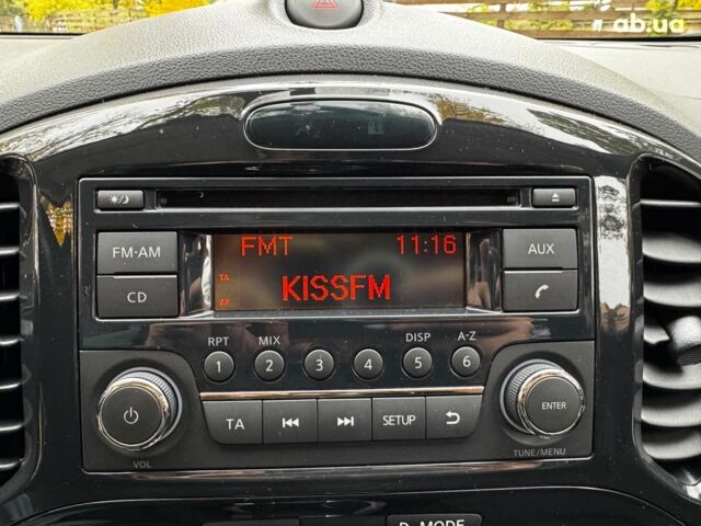 Красный Ниссан Жук, объемом двигателя 1.6 л и пробегом 131 тыс. км за 9990 $, фото 15 на Automoto.ua