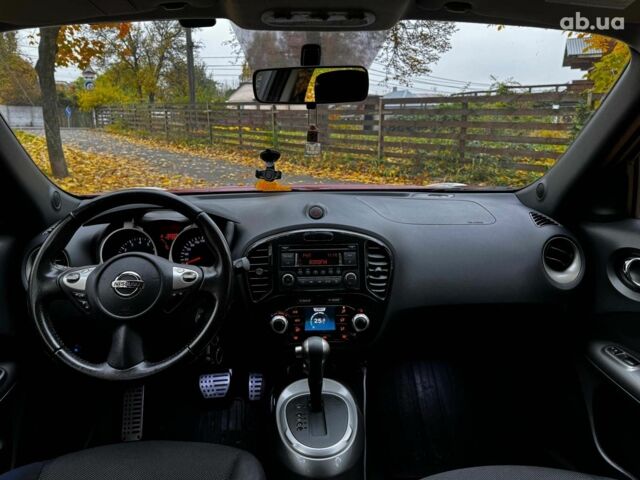 Красный Ниссан Жук, объемом двигателя 1.6 л и пробегом 131 тыс. км за 9990 $, фото 21 на Automoto.ua