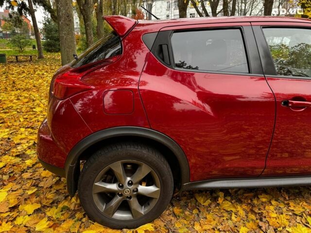 Красный Ниссан Жук, объемом двигателя 1.6 л и пробегом 131 тыс. км за 9990 $, фото 4 на Automoto.ua