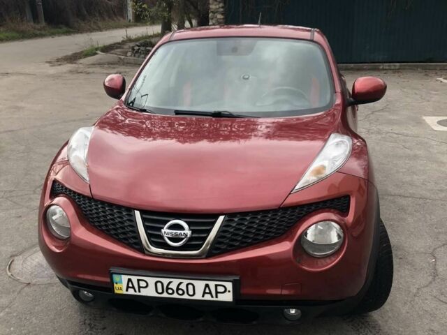 Червоний Ніссан Жук, об'ємом двигуна 1.6 л та пробігом 117 тис. км за 9099 $, фото 5 на Automoto.ua