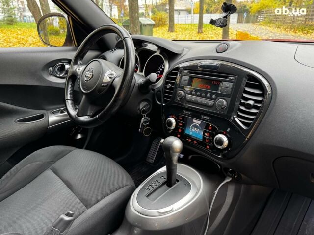 Красный Ниссан Жук, объемом двигателя 1.6 л и пробегом 131 тыс. км за 9990 $, фото 26 на Automoto.ua