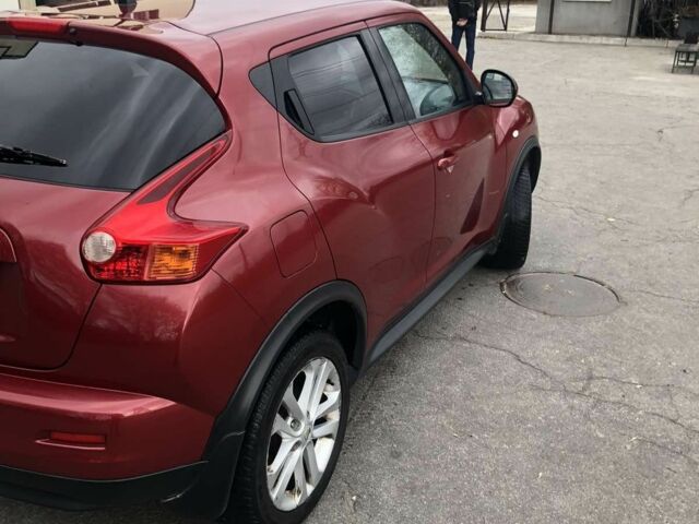 Червоний Ніссан Жук, об'ємом двигуна 1.6 л та пробігом 117 тис. км за 9099 $, фото 4 на Automoto.ua