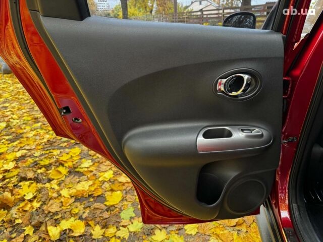 Красный Ниссан Жук, объемом двигателя 1.6 л и пробегом 131 тыс. км за 9990 $, фото 19 на Automoto.ua