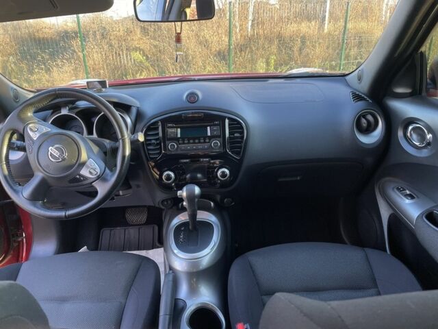 Червоний Ніссан Жук, об'ємом двигуна 1.6 л та пробігом 105 тис. км за 11300 $, фото 6 на Automoto.ua