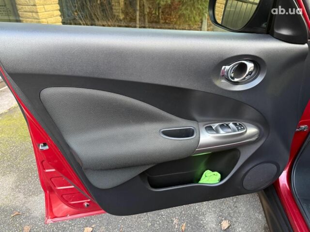 Червоний Ніссан Жук, об'ємом двигуна 1.6 л та пробігом 106 тис. км за 10390 $, фото 11 на Automoto.ua